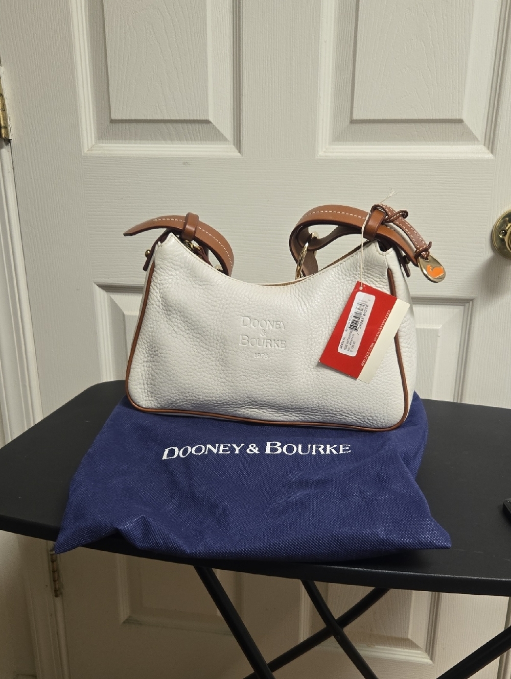 Dooney & Bourke White Pebbled Leather Shoulder Bag with Tan Trim and Strap